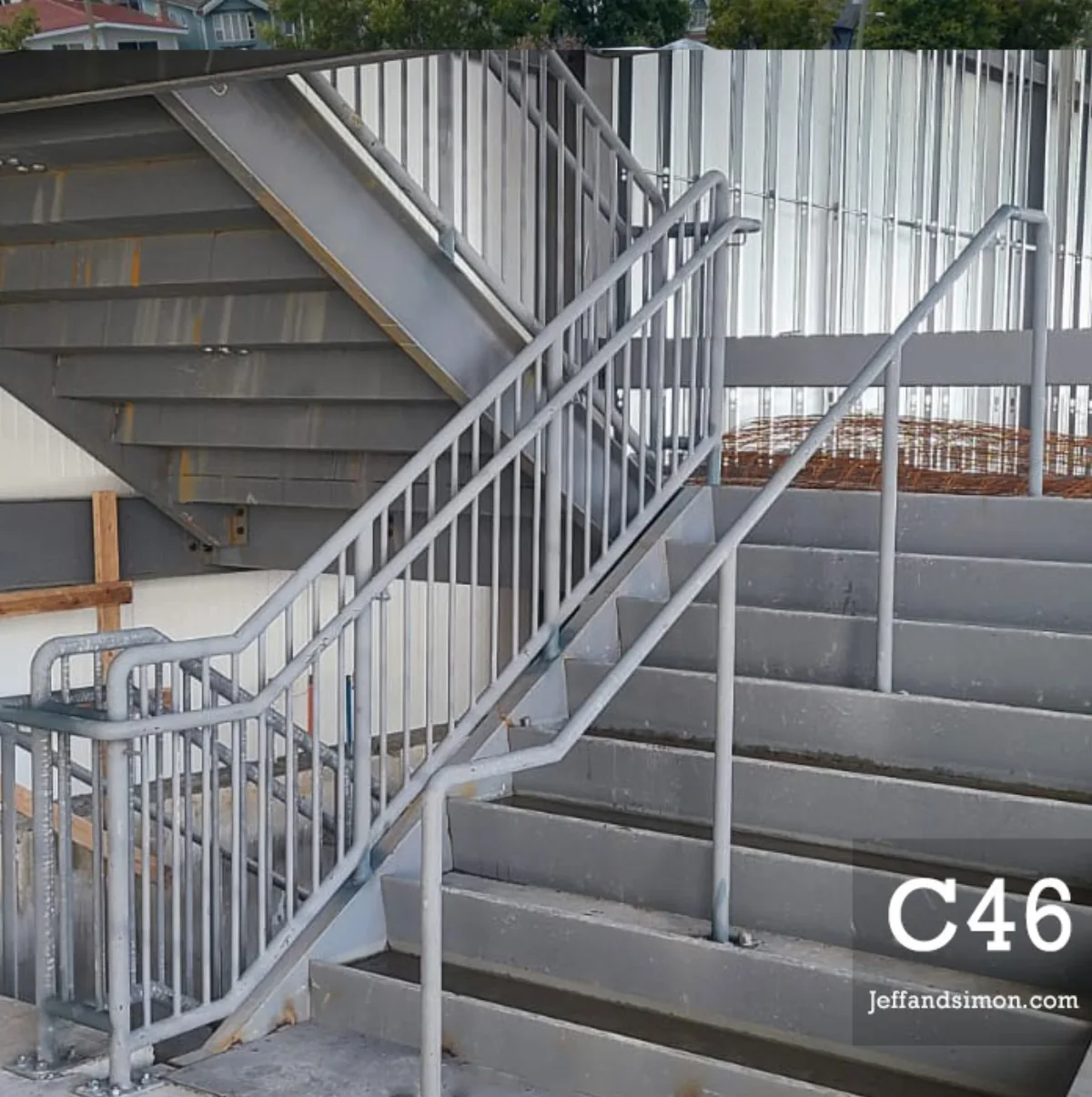 Commercial metal staircase fabricated for a high-traffic interior space